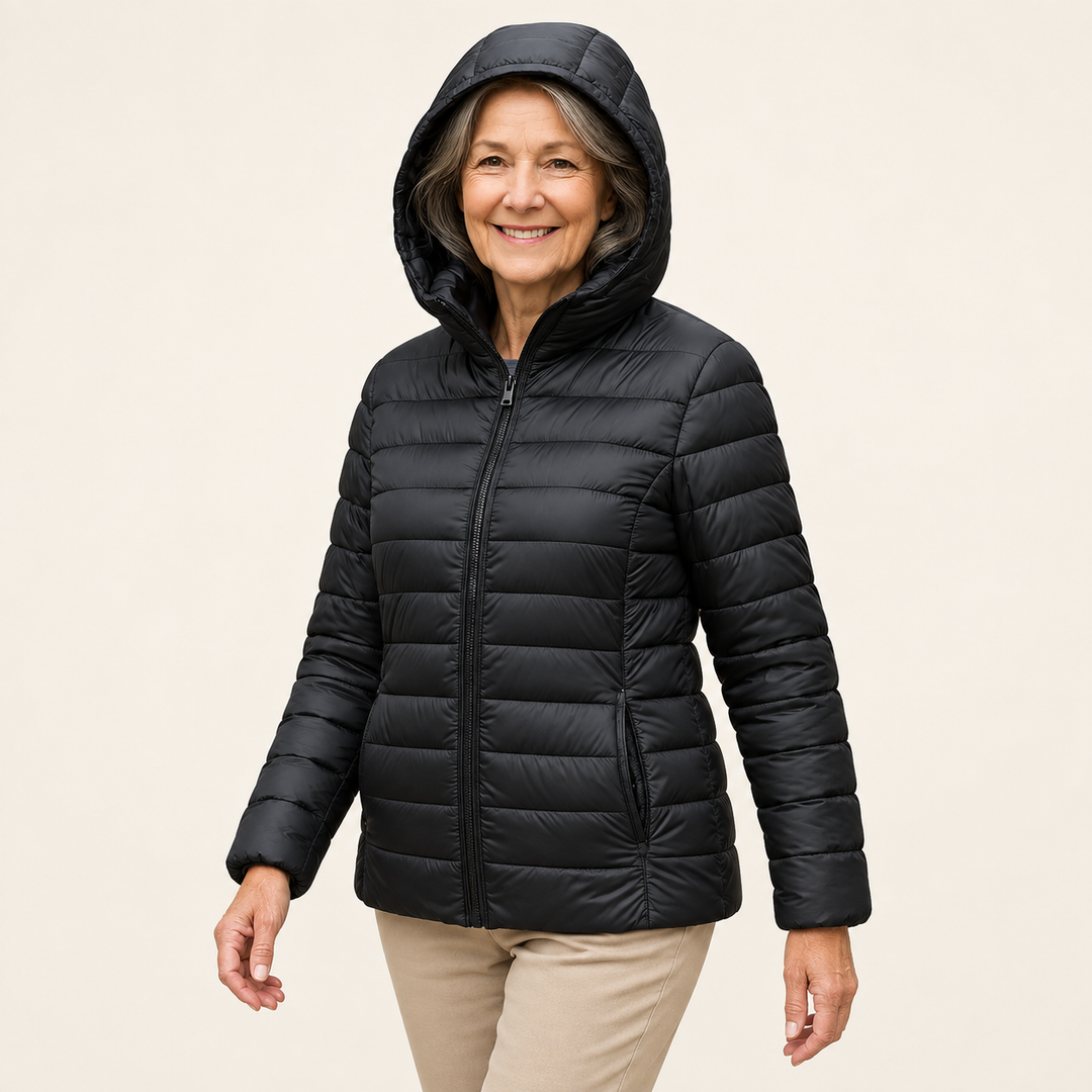 METTA Black padded jacket on mature model, three-quarter view