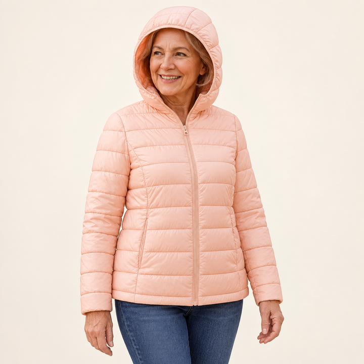METTA Light Pink padded jacket on mature model, three-quarter view