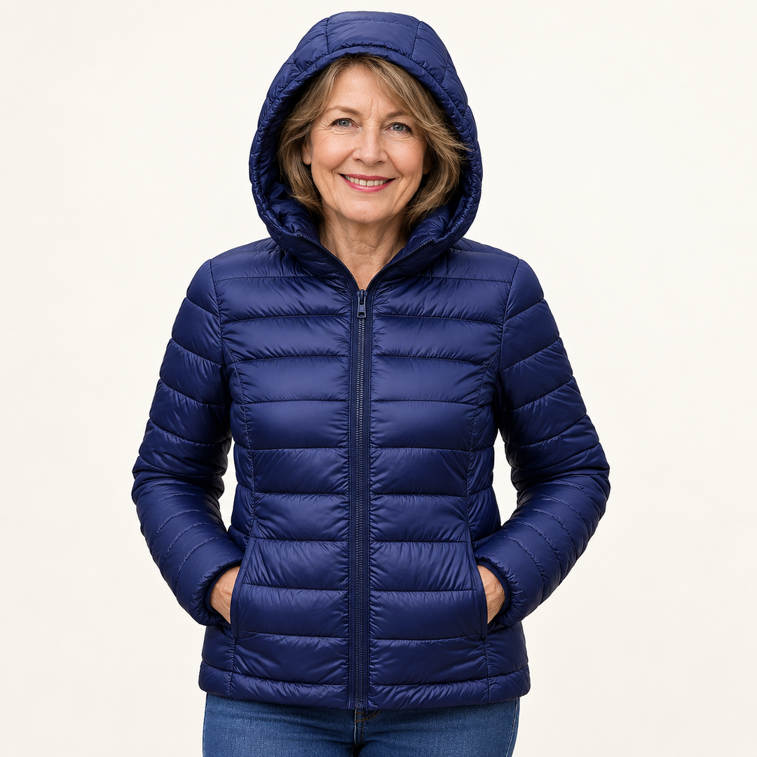 Metta transitional padded jacket in navy blue — mature model front view