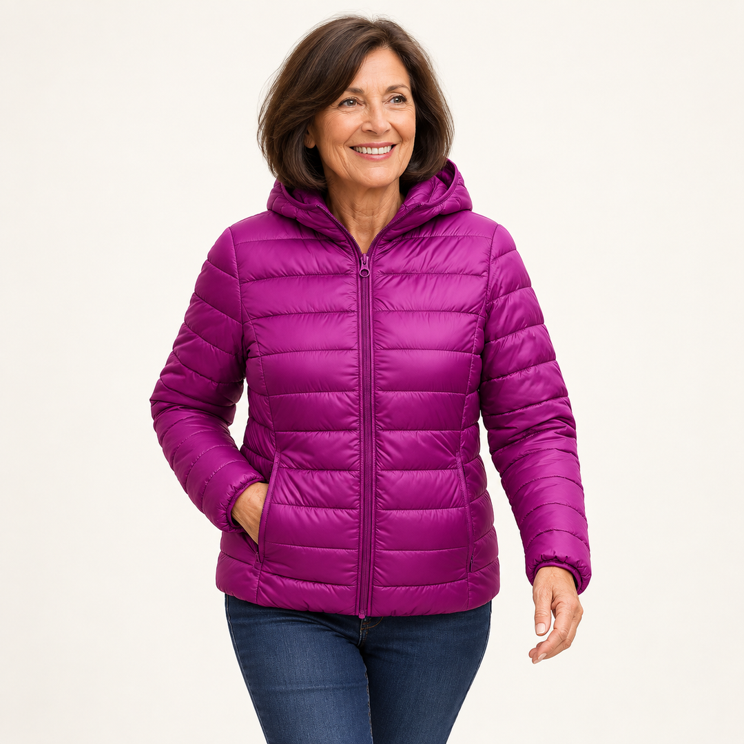 Metta transitional padded jacket in purple — mature model natural pose