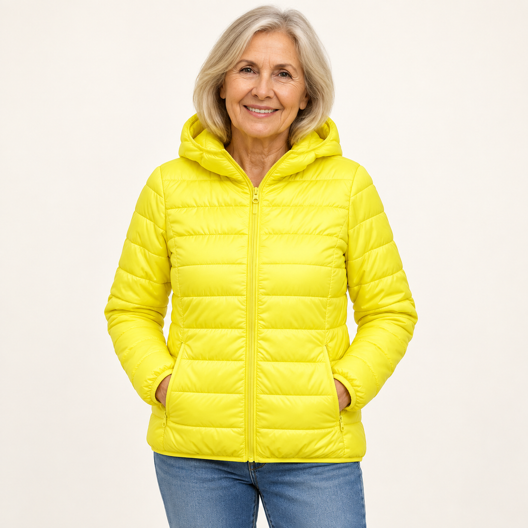 Metta transitional padded jacket in yellow — mature model front view