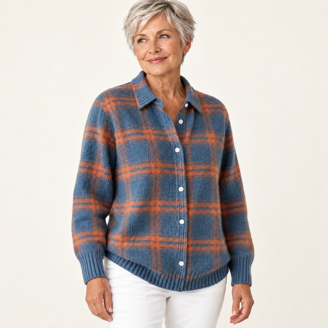 MIRELLA checked knit shirt worn by a mature British woman in a three-quarter studio view