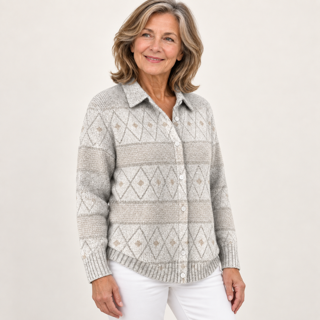 MONIRA patterned knit shirt worn by a mature British woman in a three-quarter studio view