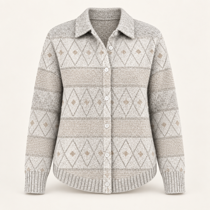 MONIRA pale patterned knit shirt isolated on a clean warm off-white background