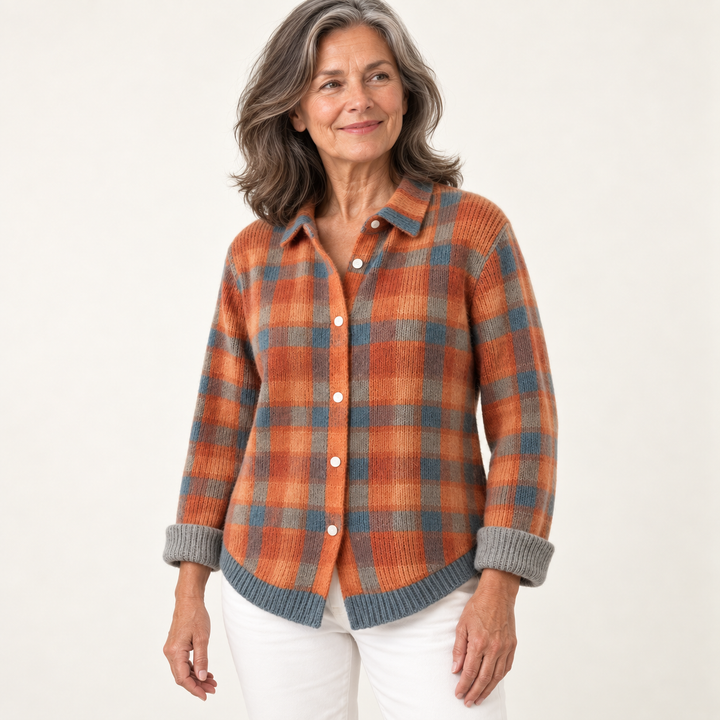 SAFIYA checked knit shirt worn by a mature British woman in a three-quarter studio view