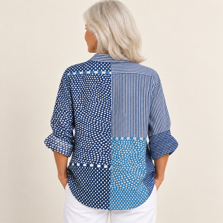 Sláine blue patchwork shirt on same mature model, back view, square 1:1