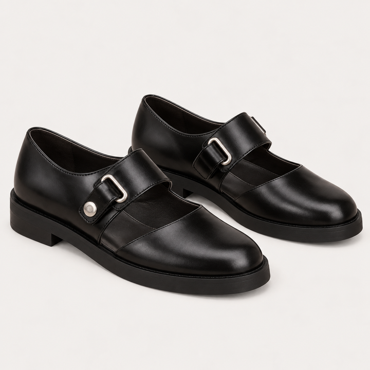 Sofia black wide-strap shoes isolated, front three-quarter view