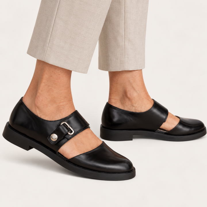 Sofia black wide strap Mary Jane shoes worn side view