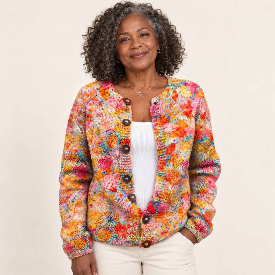 Helena | Knitted Cardigan with Buttons and Painted Floral Print worn by a mature woman on a clean background