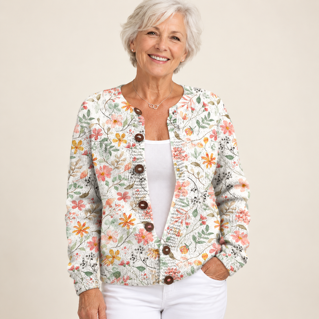 Greta | Watercolour Floral Knit Cardigan with Wooden Buttons worn by a mature woman on a clean background