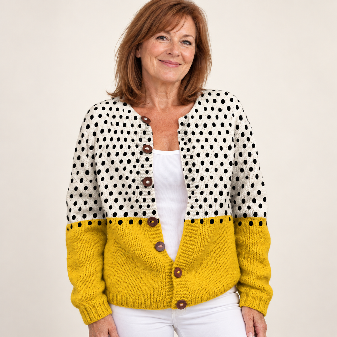 Junella | Colourful Polka Dot Knit Cardigan with Wooden Buttons worn by a mature woman on a clean background