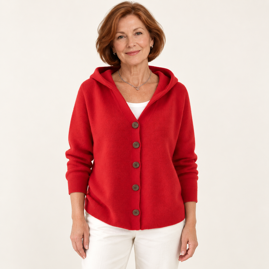 Éléonore Red Hooded Cardigan worn by a mature woman on a clean studio background