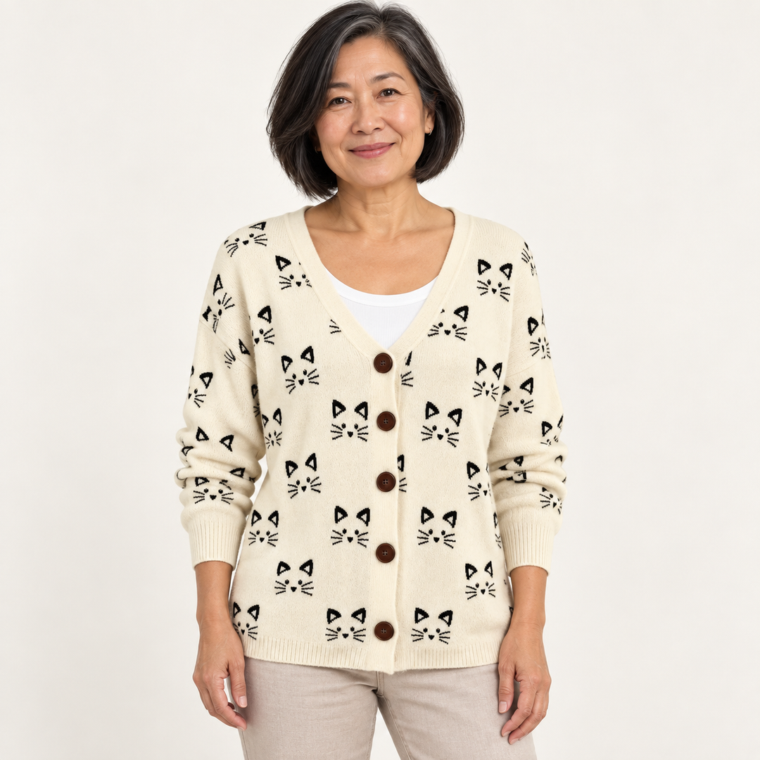 Églantine Minimalist Cat-Print Cardigan worn by a mature woman on a clean studio background