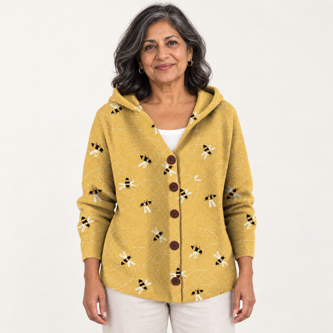 Clotilde Bee-Print Hooded Cardigan worn by a mature woman on a clean studio background