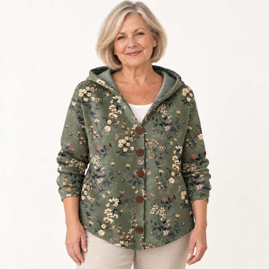 Domitille Wild Garden Hooded Cardigan worn by a mature woman on a clean studio background