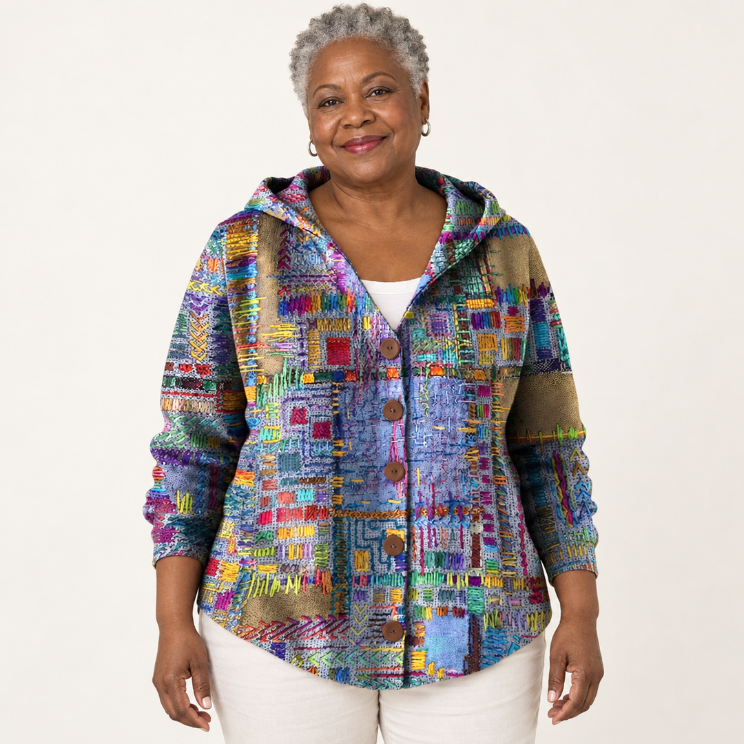 Isaline Artistic Patchwork Hooded Cardigan worn by a mature woman on a clean studio background
