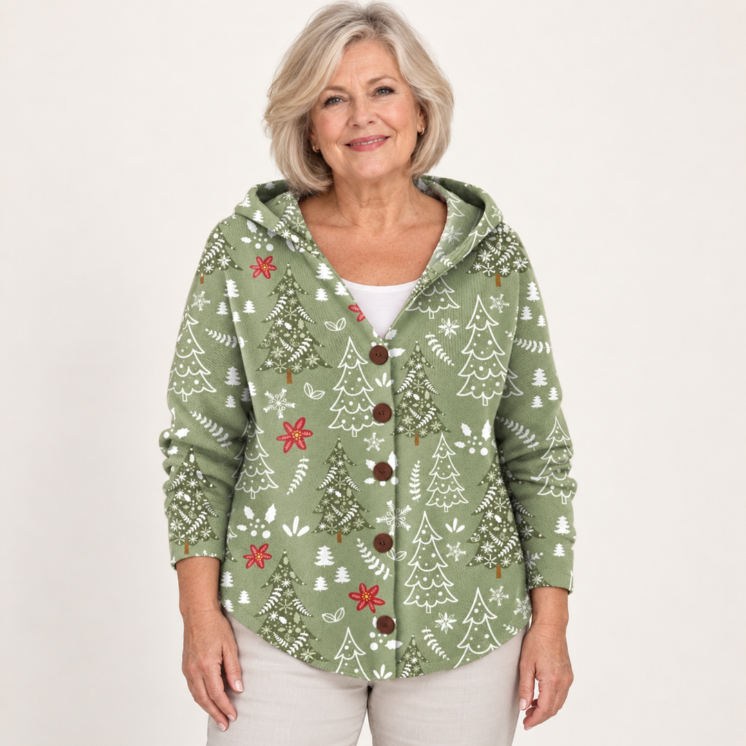 Eulalie Festive Forest Hooded Cardigan worn by a mature woman on a clean studio background