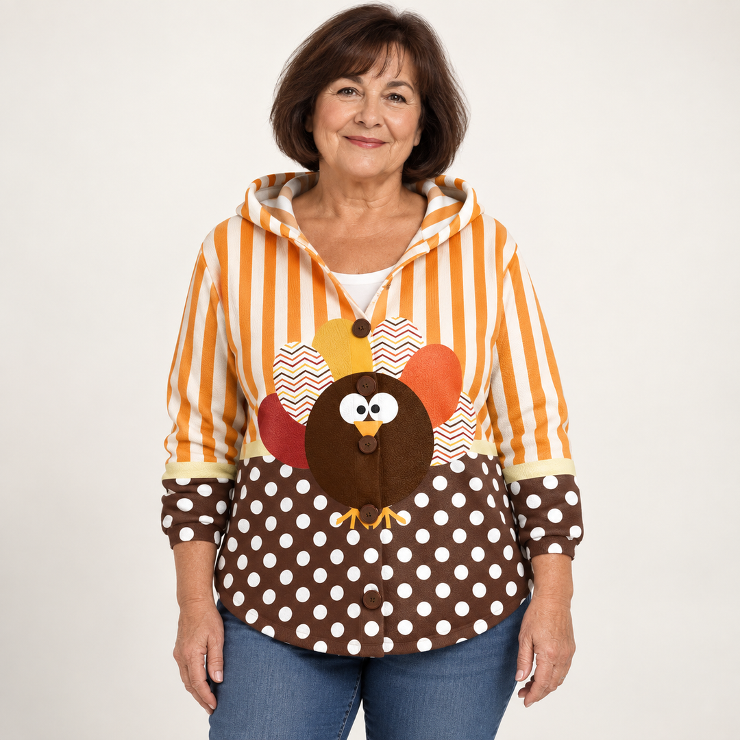 Valerie Turkey Graphic Hooded Cardigan worn by a mature woman on a clean studio background