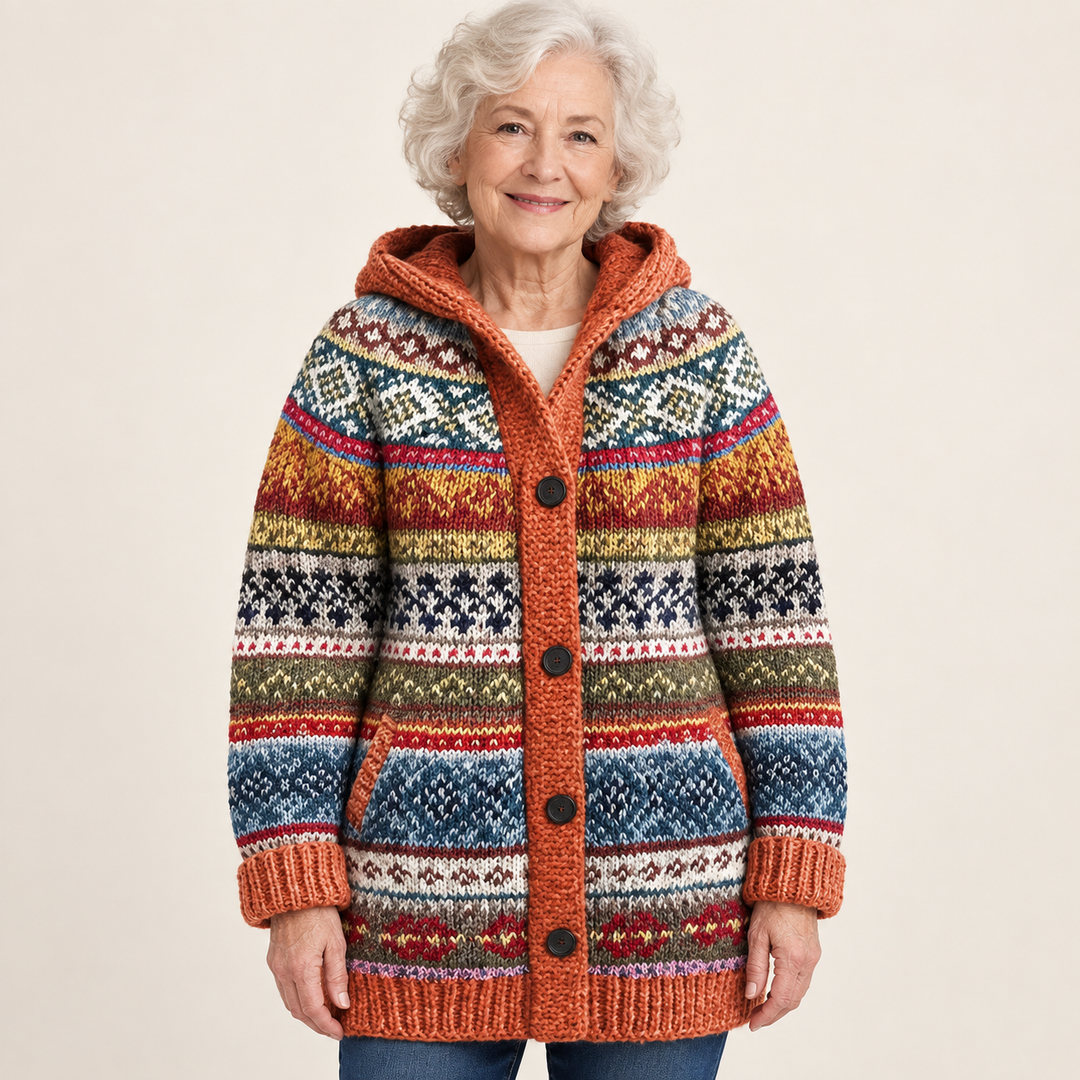 Madison cardigan in Orange, worn by a mature woman on a clean background