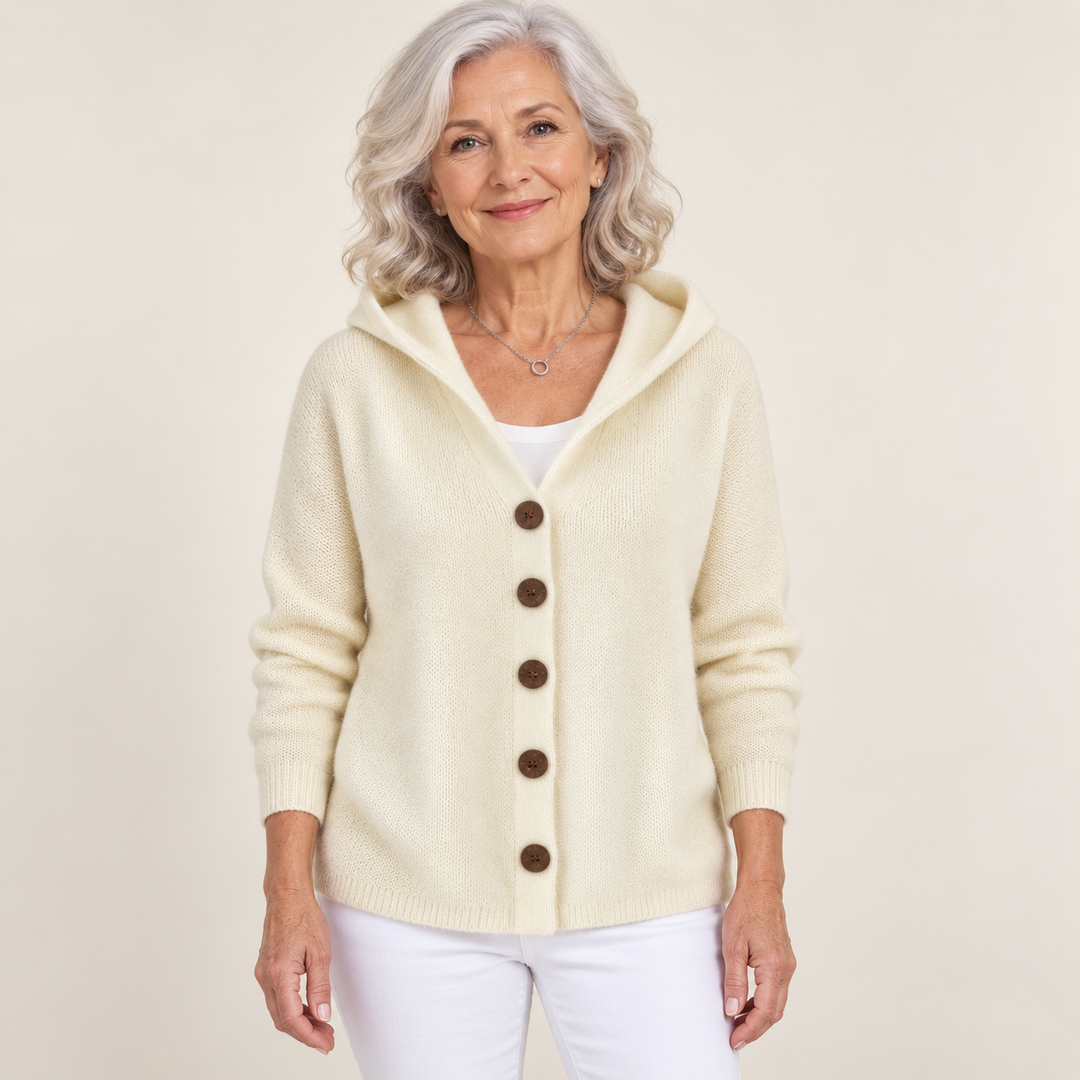 Teri cardigan in Beige, worn by a mature woman on a clean background