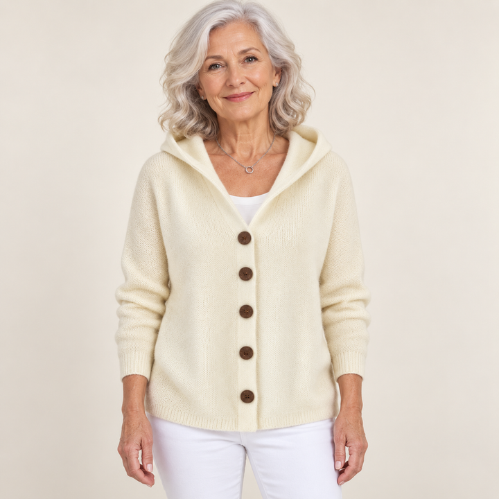 Teri cardigan in Beige, worn by a mature woman on a clean background