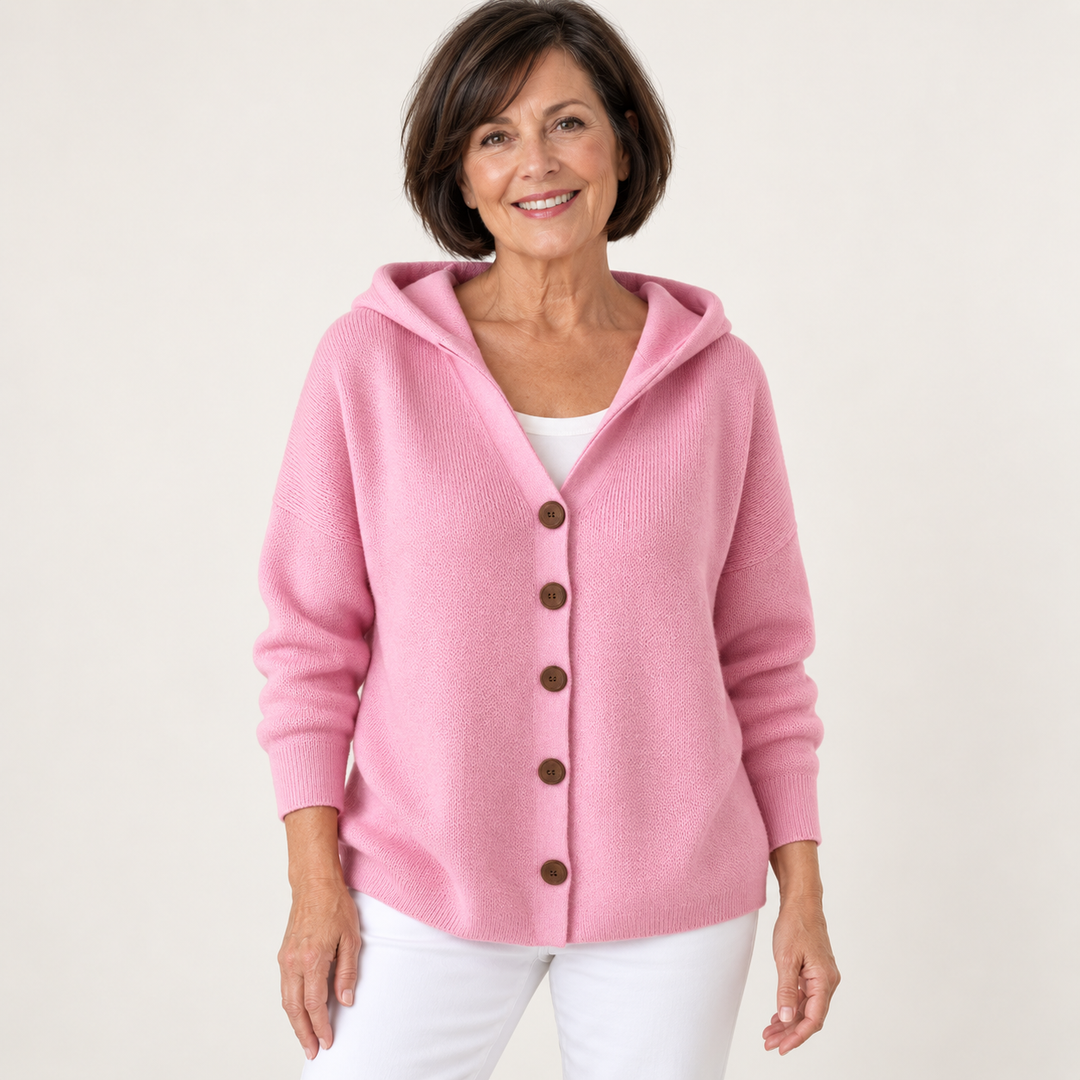 Teri cardigan in Pink, worn by a mature woman on a clean background