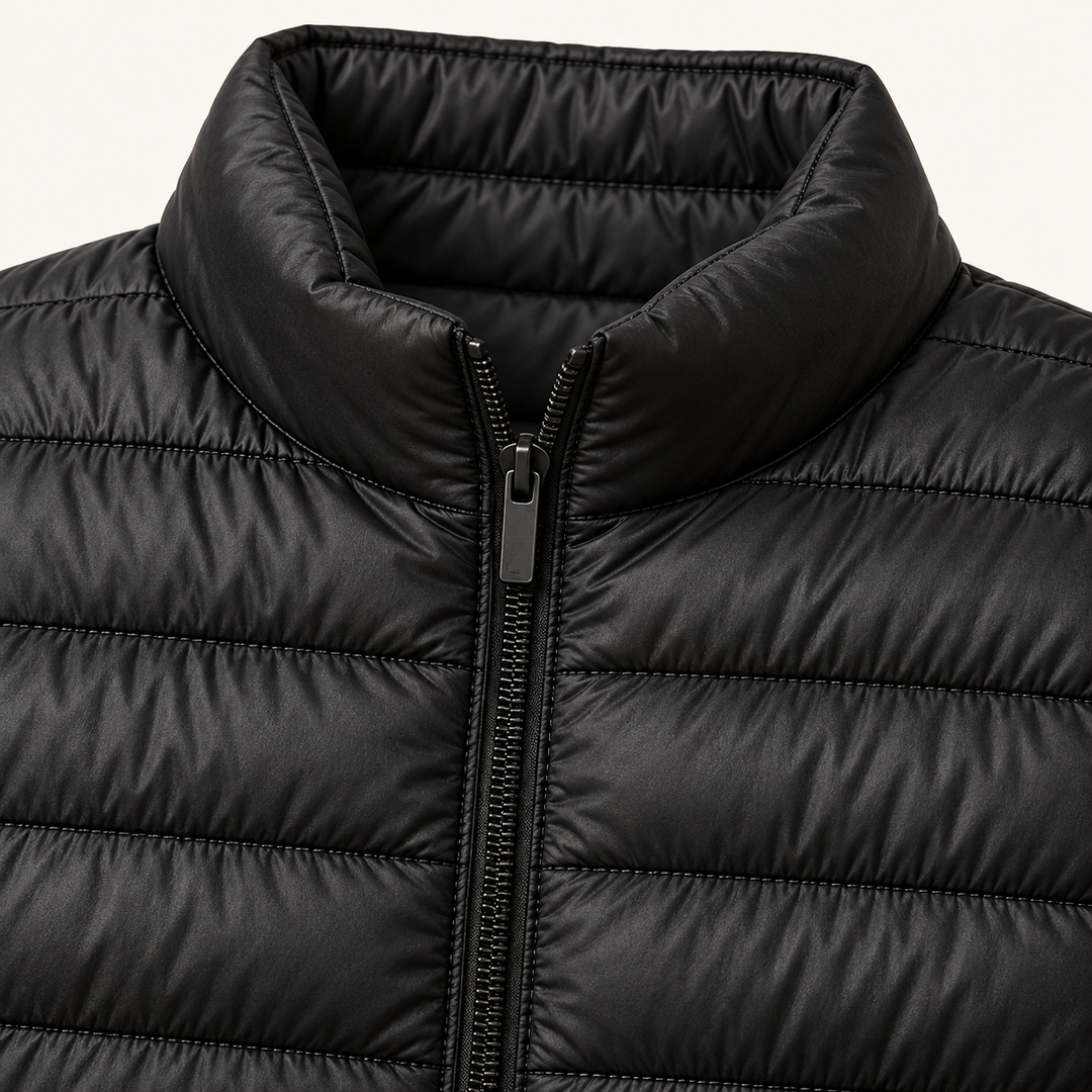 Ulla transitional padded jacket in Black, close-up of stand collar, zip and quilting