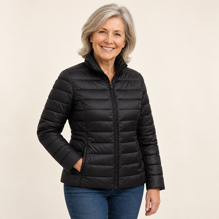 Ulla transitional padded jacket in Black worn by a mature woman, three-quarter view