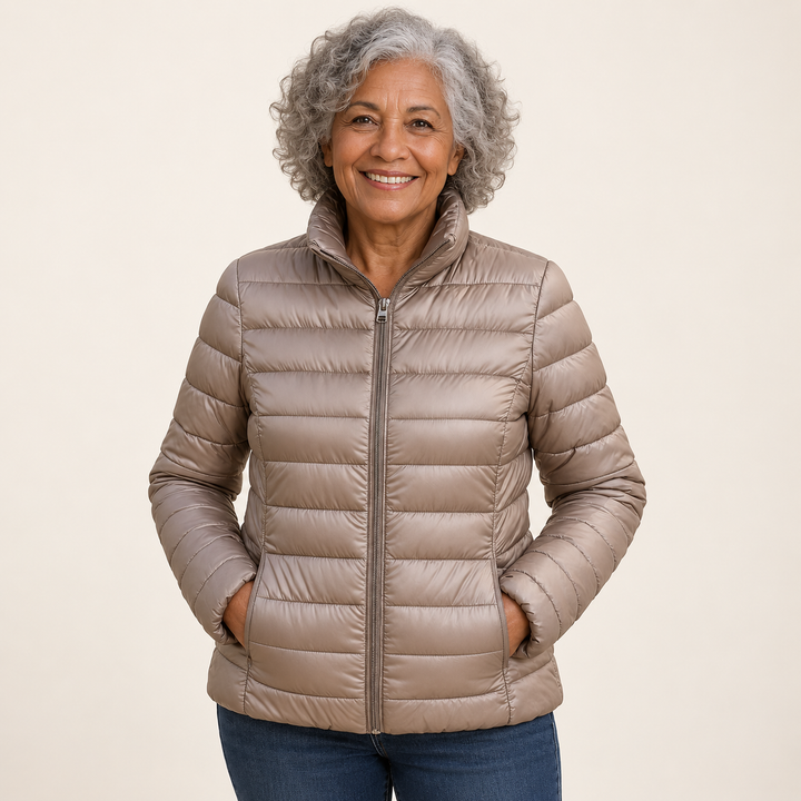 Ulla transitional padded jacket in Champagne worn by a mature woman, front view