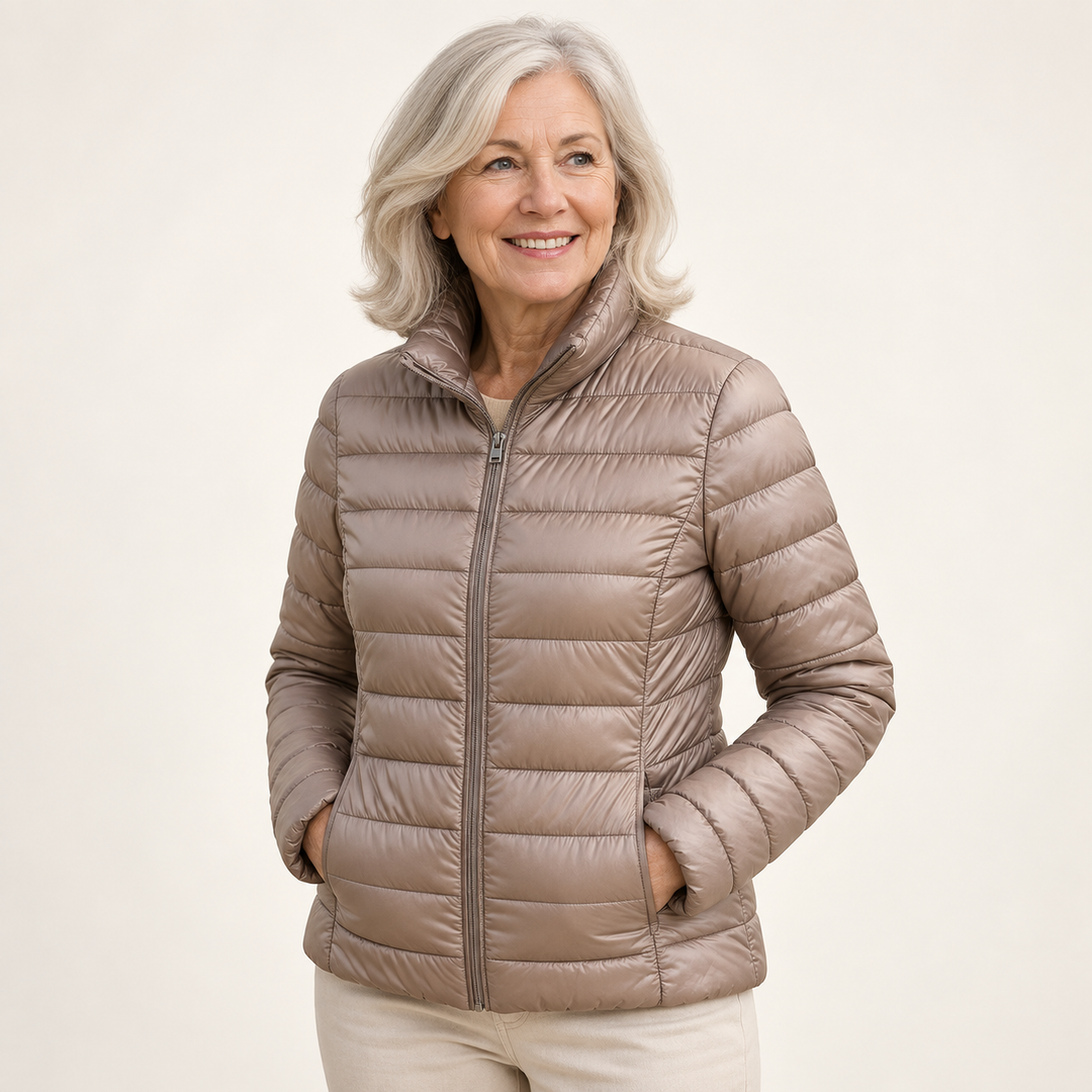 Ulla transitional padded jacket in Champagne worn by a mature woman, three-quarter view