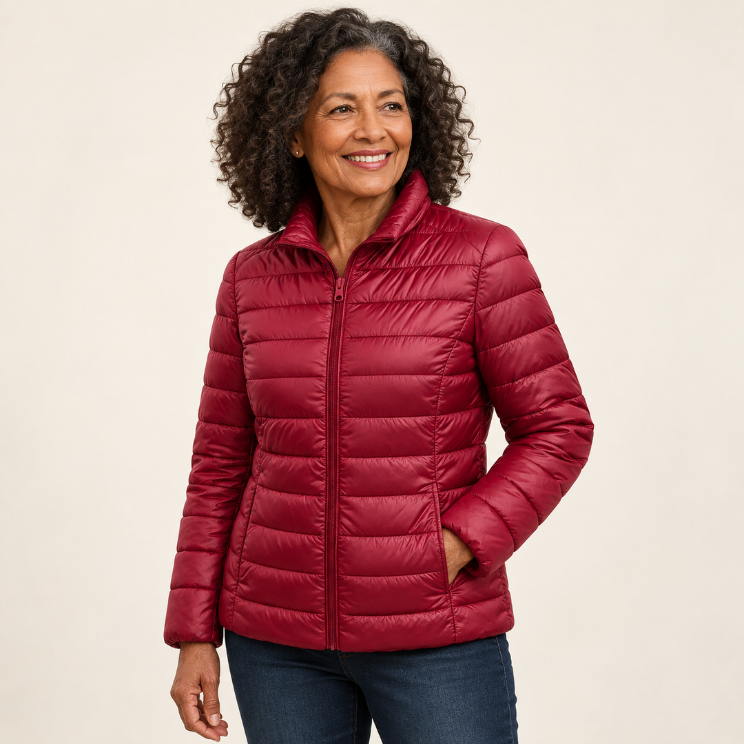 Ulla transitional padded jacket in Dark Red worn by a mature woman, three-quarter view