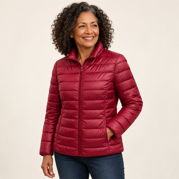Ulla transitional padded jacket in Dark Red worn by a mature woman, three-quarter view