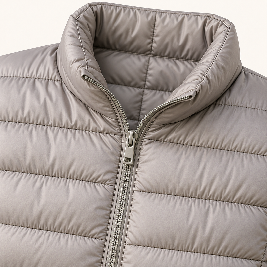 Ulla transitional padded jacket in Grey, close-up of stand collar, zip and quilting