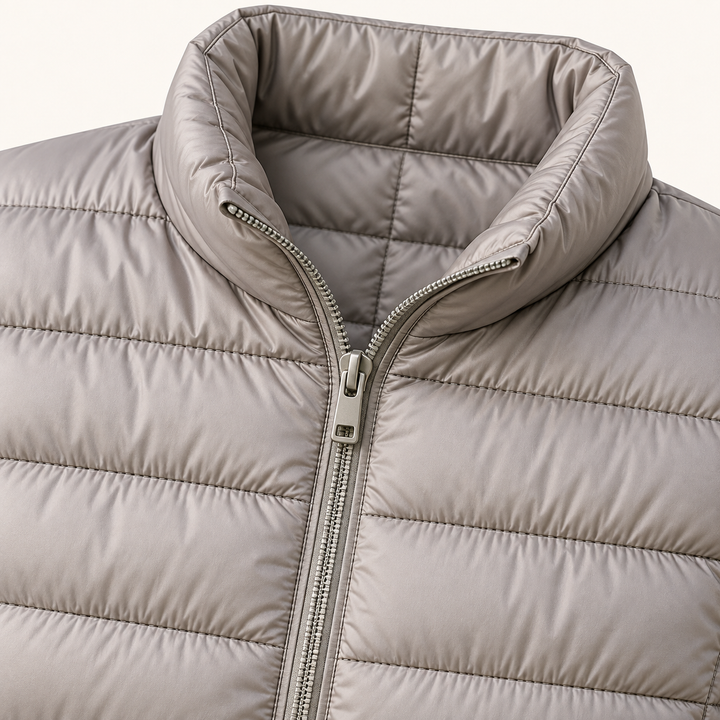 Ulla transitional padded jacket in Grey, close-up of stand collar, zip and quilting