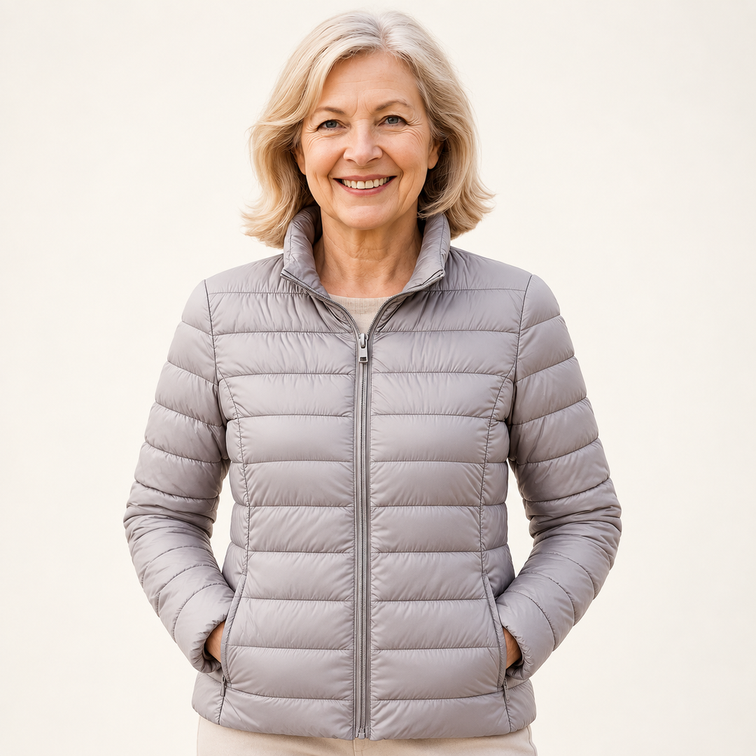 Ulla transitional padded jacket in Grey worn by a mature woman, front view