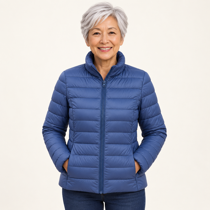 Ulla transitional padded jacket in Indigo worn by a mature woman, front view