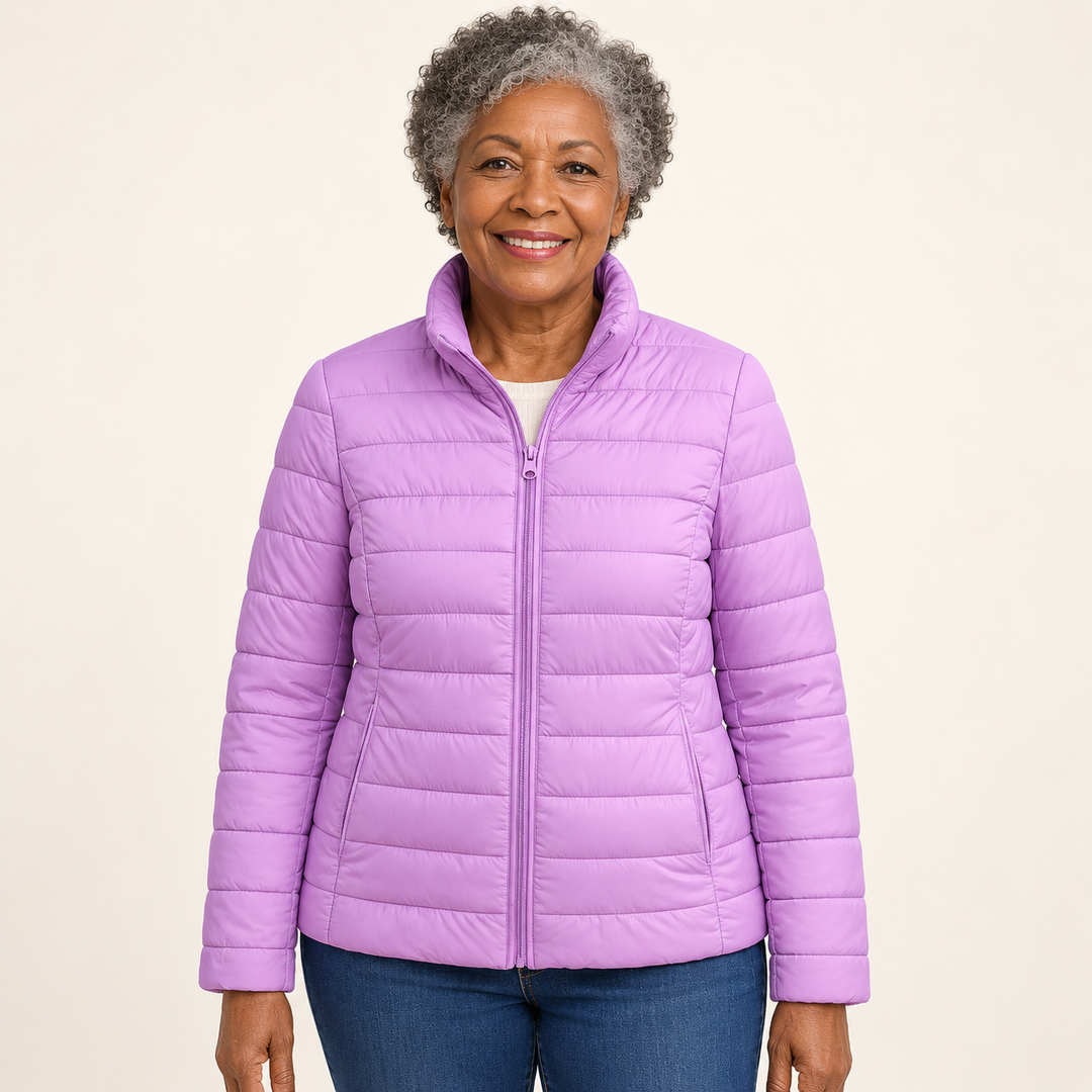 Ulla transitional padded jacket in Lilac worn by a mature woman, front view