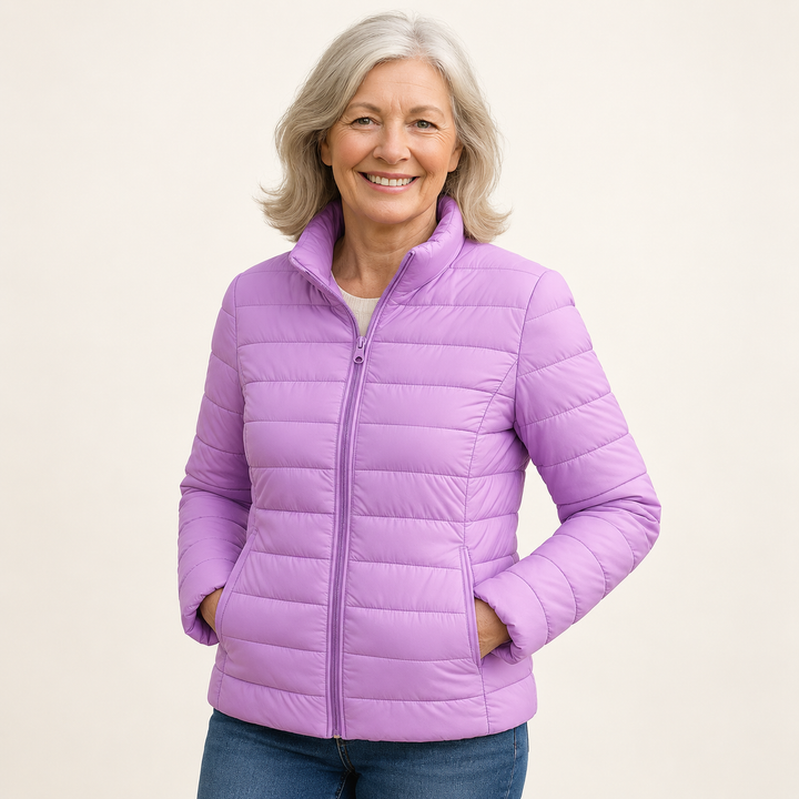 Ulla transitional padded jacket in Lilac worn by a mature woman, three-quarter view