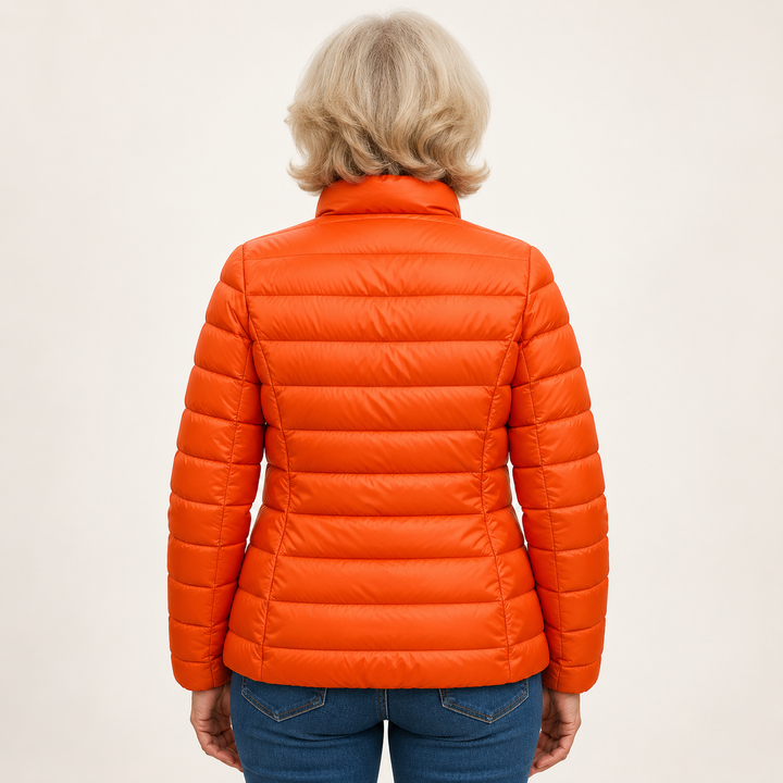 Ulla transitional padded jacket in Orange, back view
