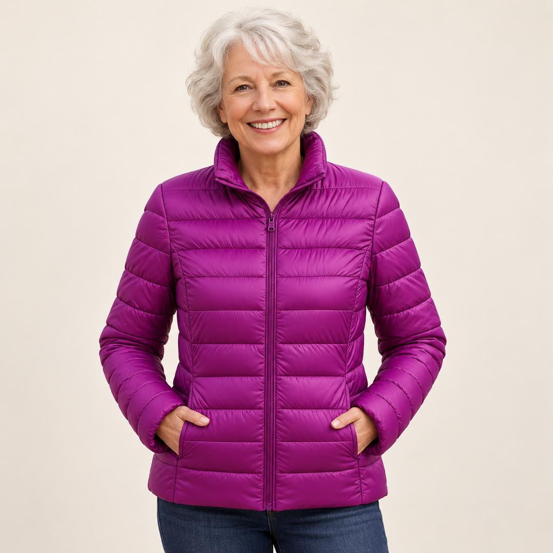 Ulla transitional padded jacket in Purple worn by a mature woman, natural studio pose