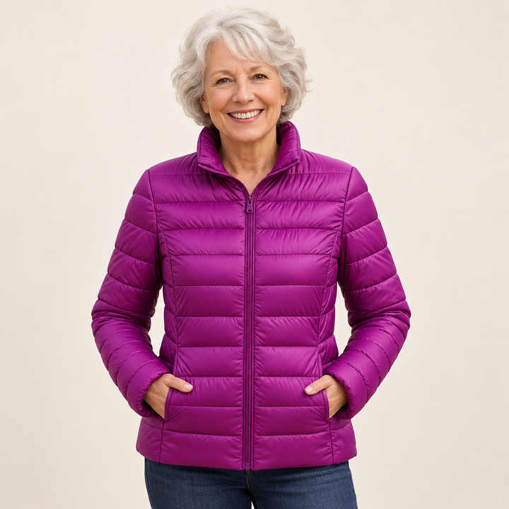 Ulla transitional padded jacket in Purple worn by a mature woman, natural studio pose