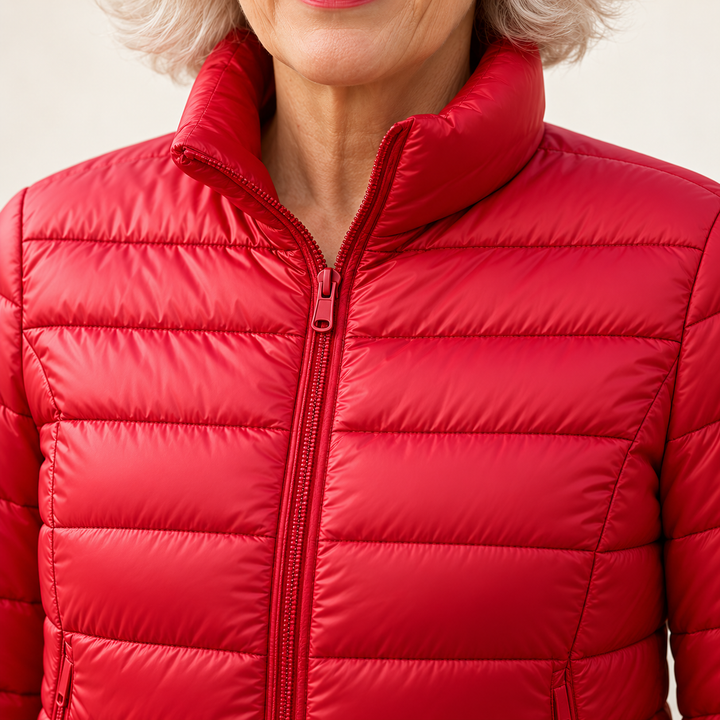 Ulla transitional padded jacket in Red, close-up of stand collar, zip and quilting