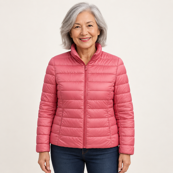 Ulla transitional padded jacket in Salmon worn by a mature woman, front view