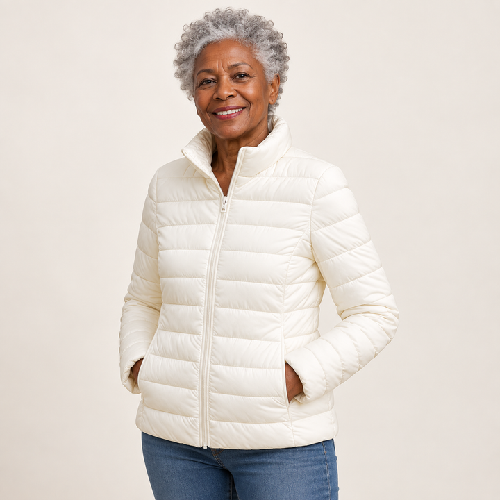 Ulla transitional padded jacket in White worn by a mature woman, three-quarter view