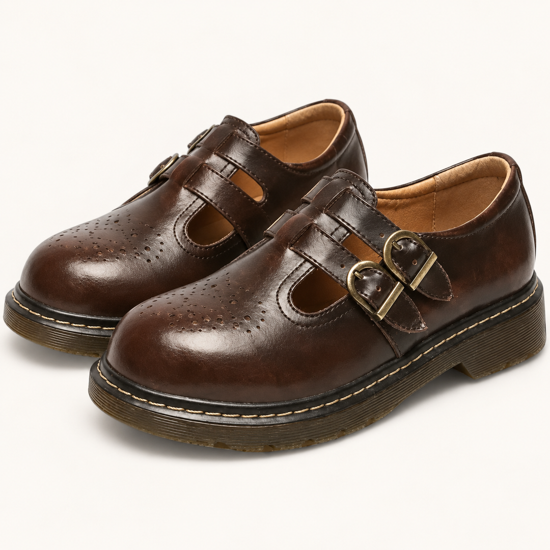 Viola brown double buckle brogue shoes isolated three-quarter view