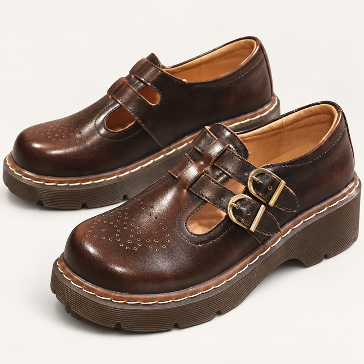 Viola brown double-buckle shoes, isolated front three-quarter view